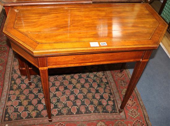 A George III satinwood banded mahogany card table, with canted sides W.94cm